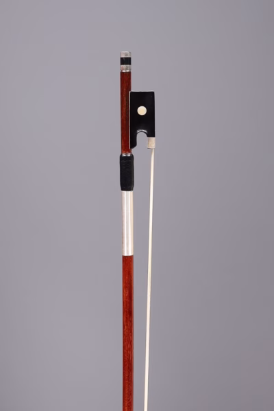 Violin bow stamped 'A Warrick Leeds'