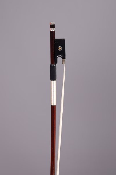 Violin bow stamped 'Wilhelm Raum'
